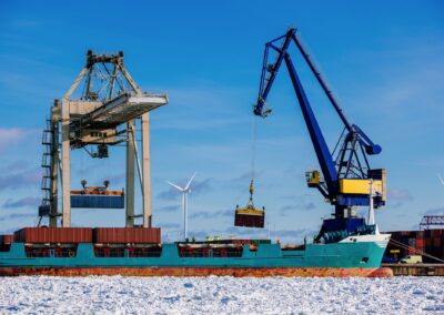 Industrial port with containers, vessel loading in port of Finland